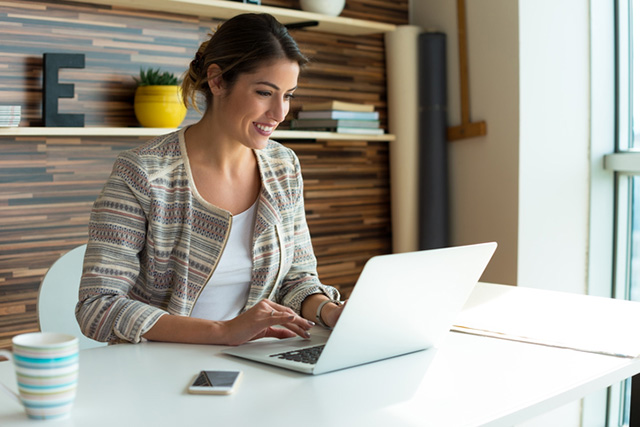 Young Women working on a  Computer